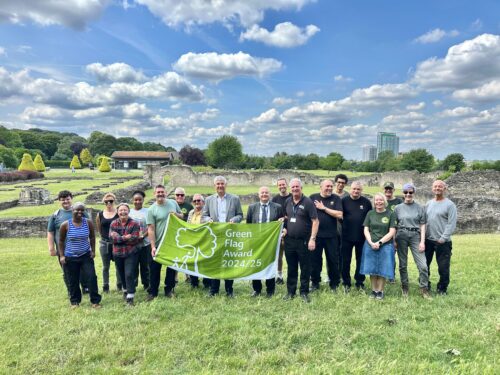 19 people standing in front of Lesnes Abbey with new 2024 Green Flag Award