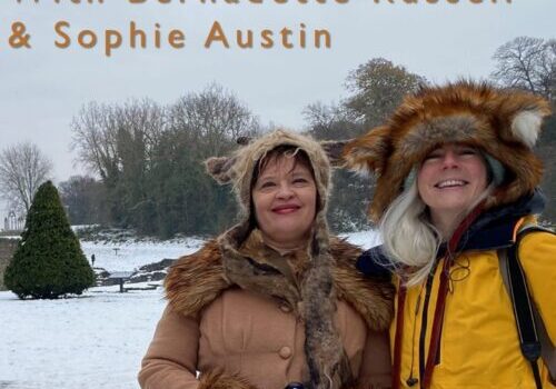 two people in a snowy landscape at Lesnes Abbey